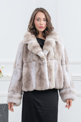 Lavender chinchilla fur short jacket featuring a wide collar, long sleeves, and a multi-panel construction with vertical and horizontal fur strips.