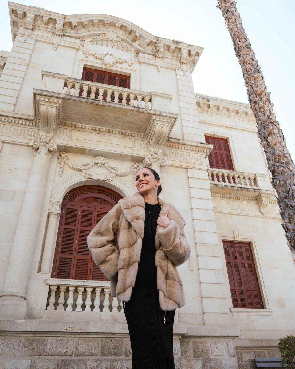 Model wearing fur jacket in cyprus