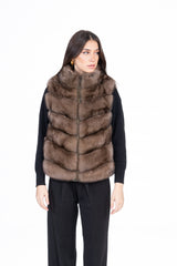Reversible short vest with a brown Russian sable fur side, featuring a front-zip closure and horizontally paneled, plush sable fur texture.