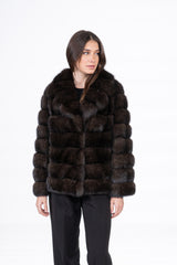 A short Russian sable jacket featuring wide horizontal fur bands, a large notched collar, and a straight silhouette.