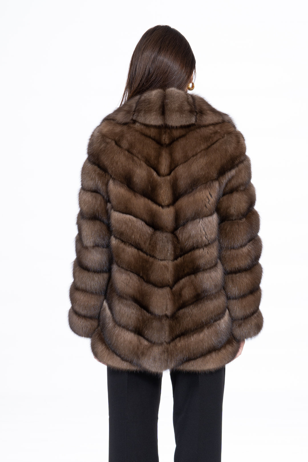 Luxurious Platinum Russian sable fur coat on display