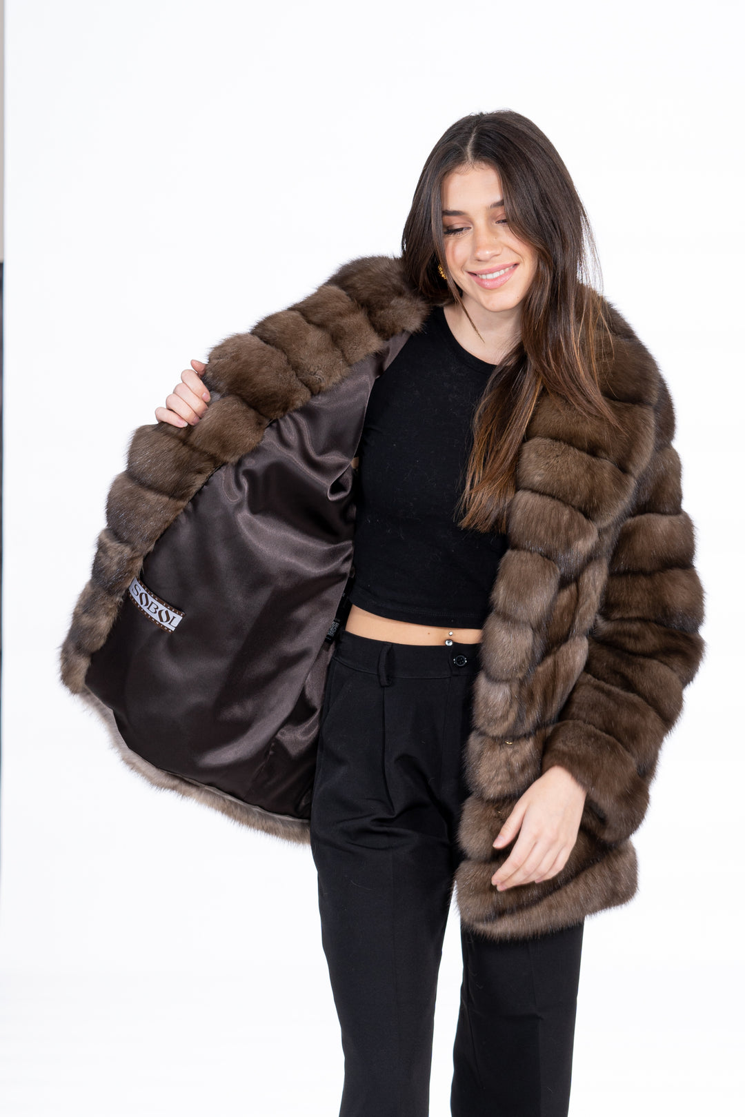 Model wearing a Platinum Russian sable fur coat by manzari