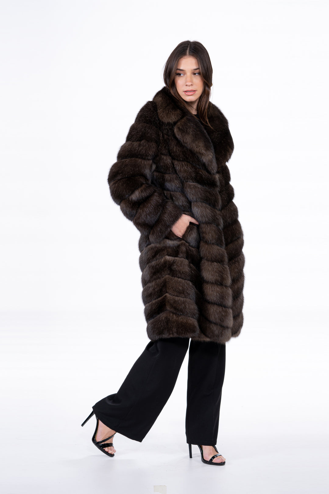 Model wearing a Silvery Russian sable fur coat by manzari