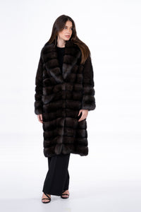 Model wearing a luxurious Russian sable fur coat by manzari