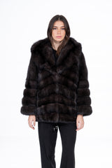 Short dark Russian sable jacket featuring a hood and V chevron patterned fur panels.