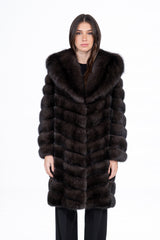 Front view of a dark silvery Russian sable jacket with a hood, featuring horizontal panels and a V-chevron construction pattern throughout.