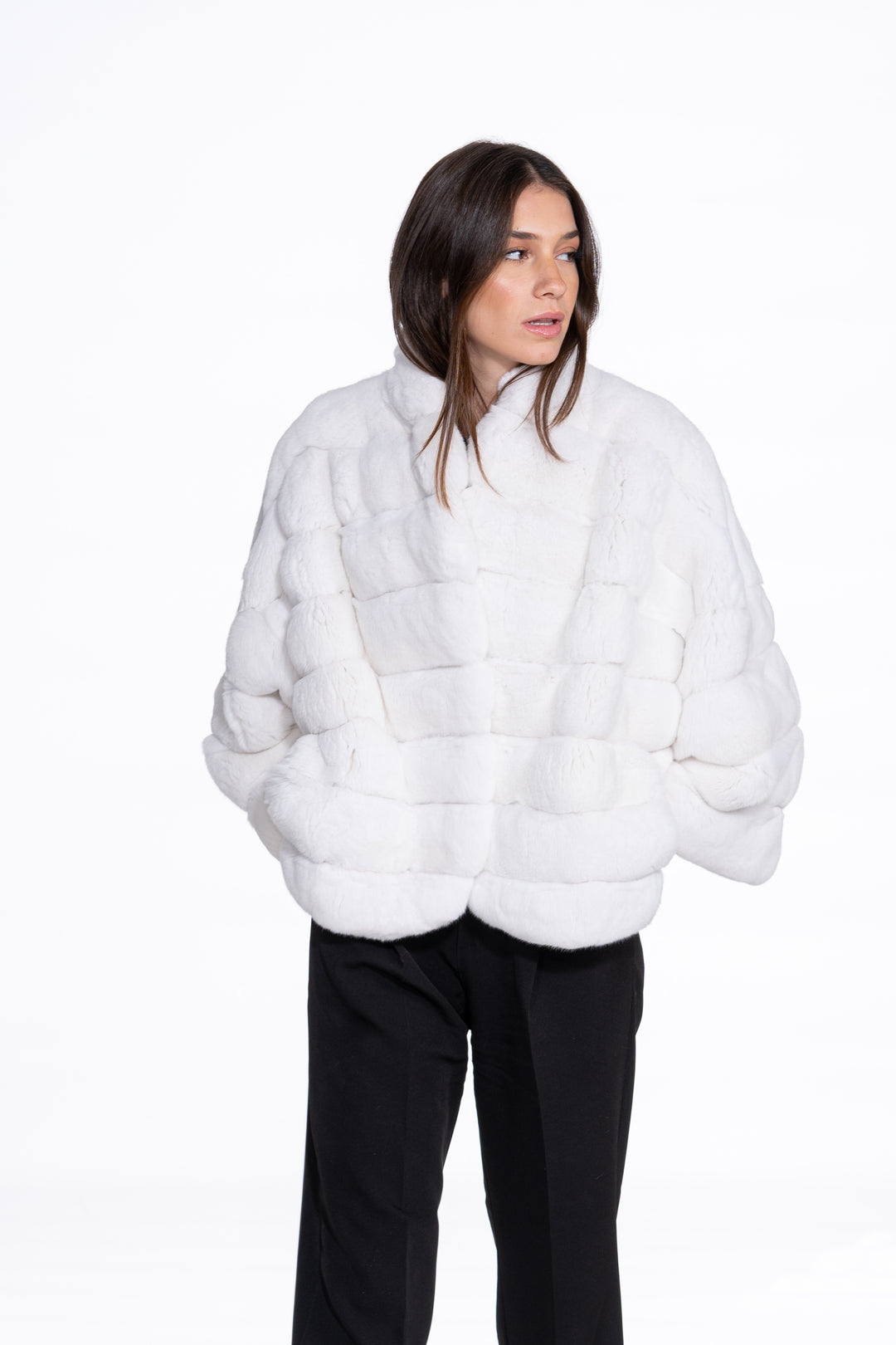 Model wearing a Snow White Chinchilla fur coat by manzari