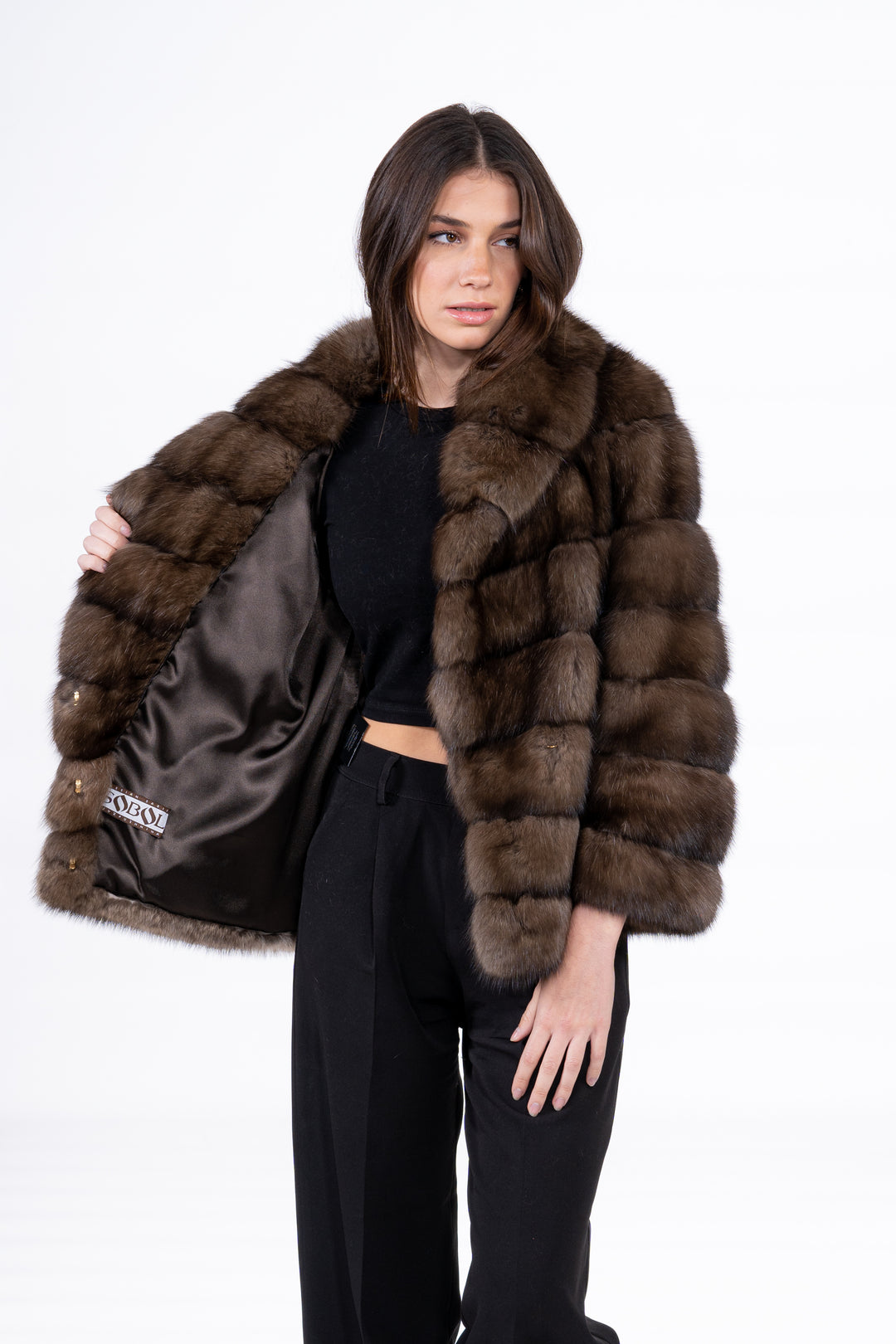 Model wearing a Platinum Russian sable fur coat by manzari