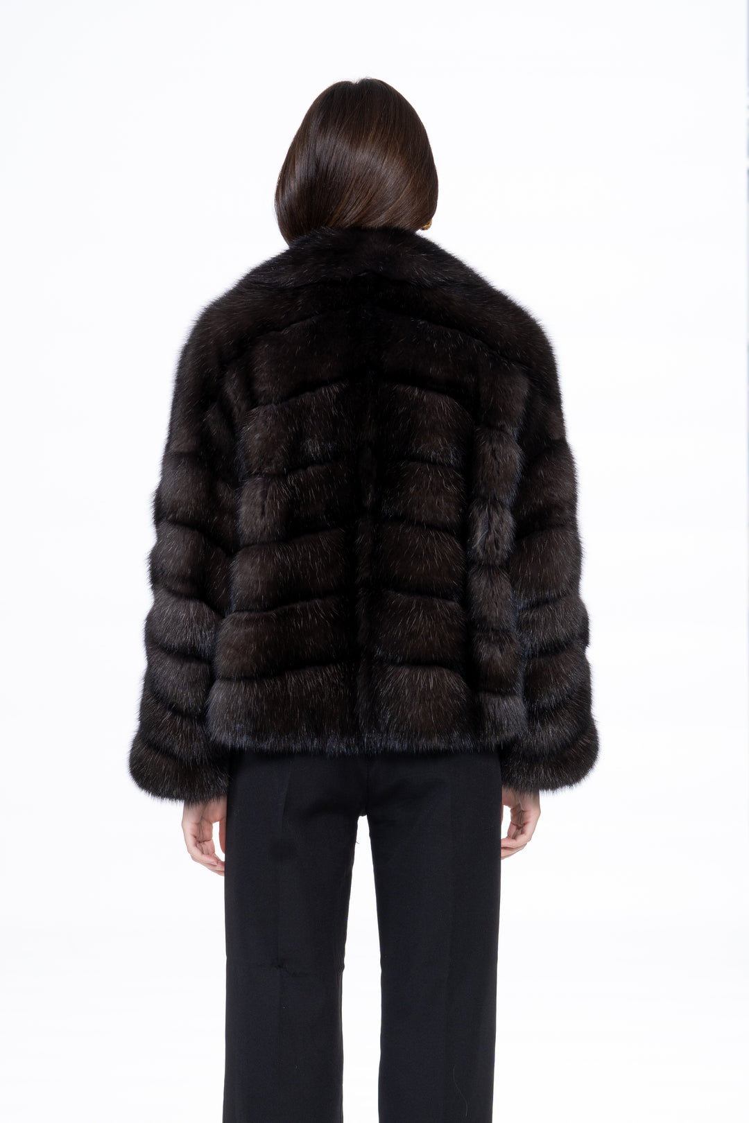 Model wearing a luxurious Russian sable fur coat by manzari