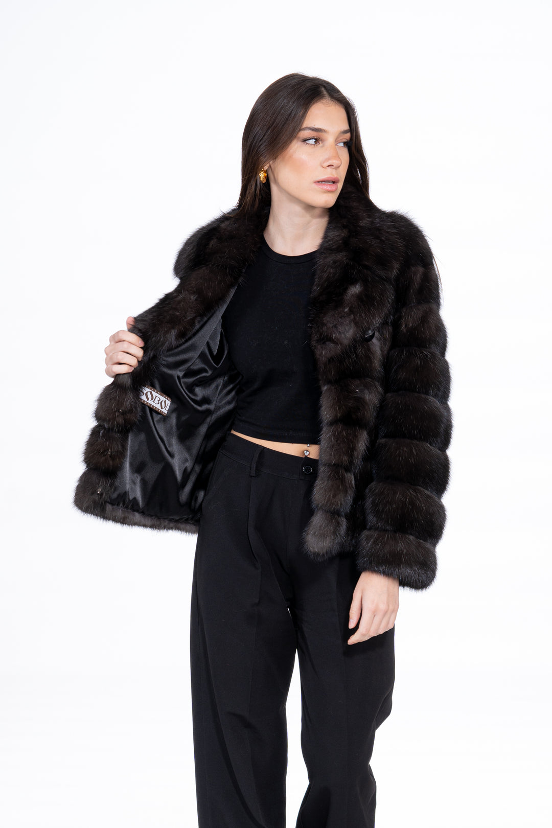 Model wearing a luxurious Russian sable fur coat by manzari