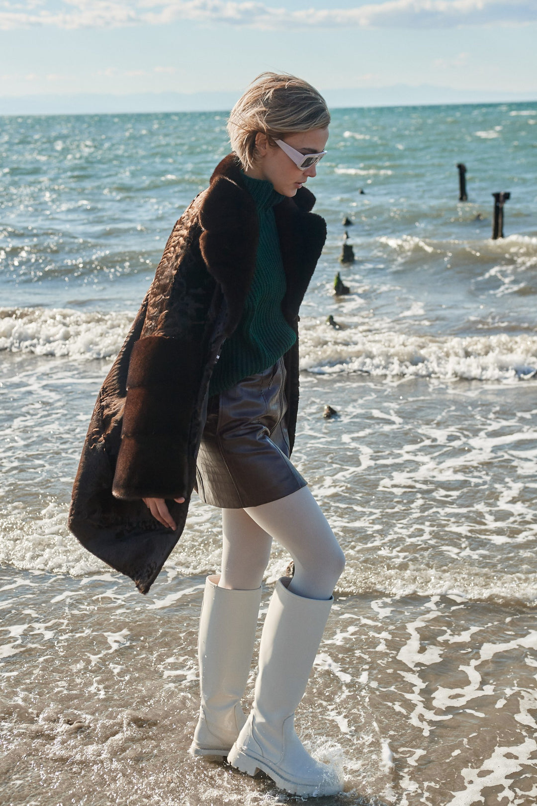 Model wearing a Chokolat Swakara fur coat by manzari