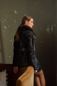 Model wearing a Black Swakara fur coat by manzari