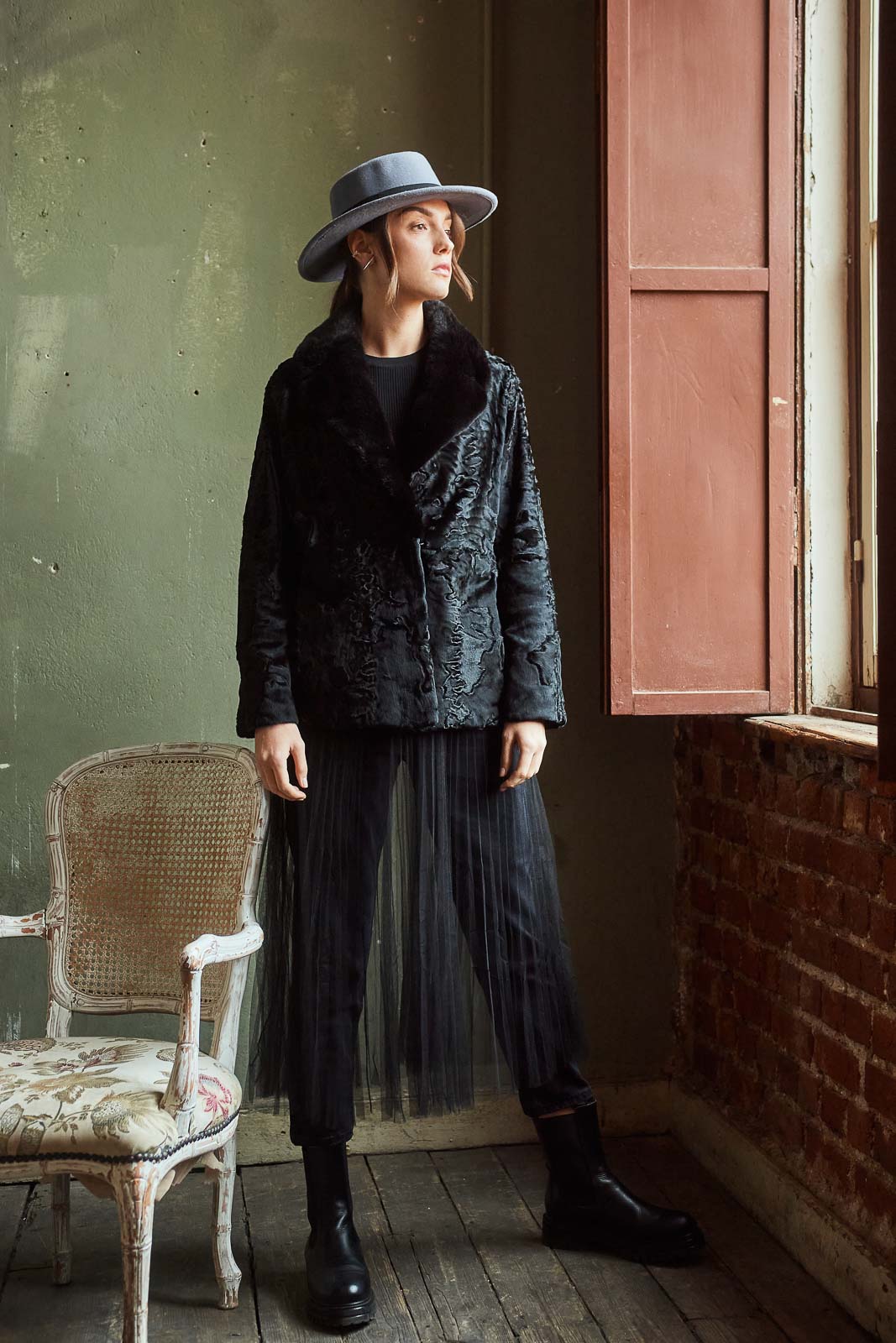 Manzari Black Swakara fur coat for a bold look