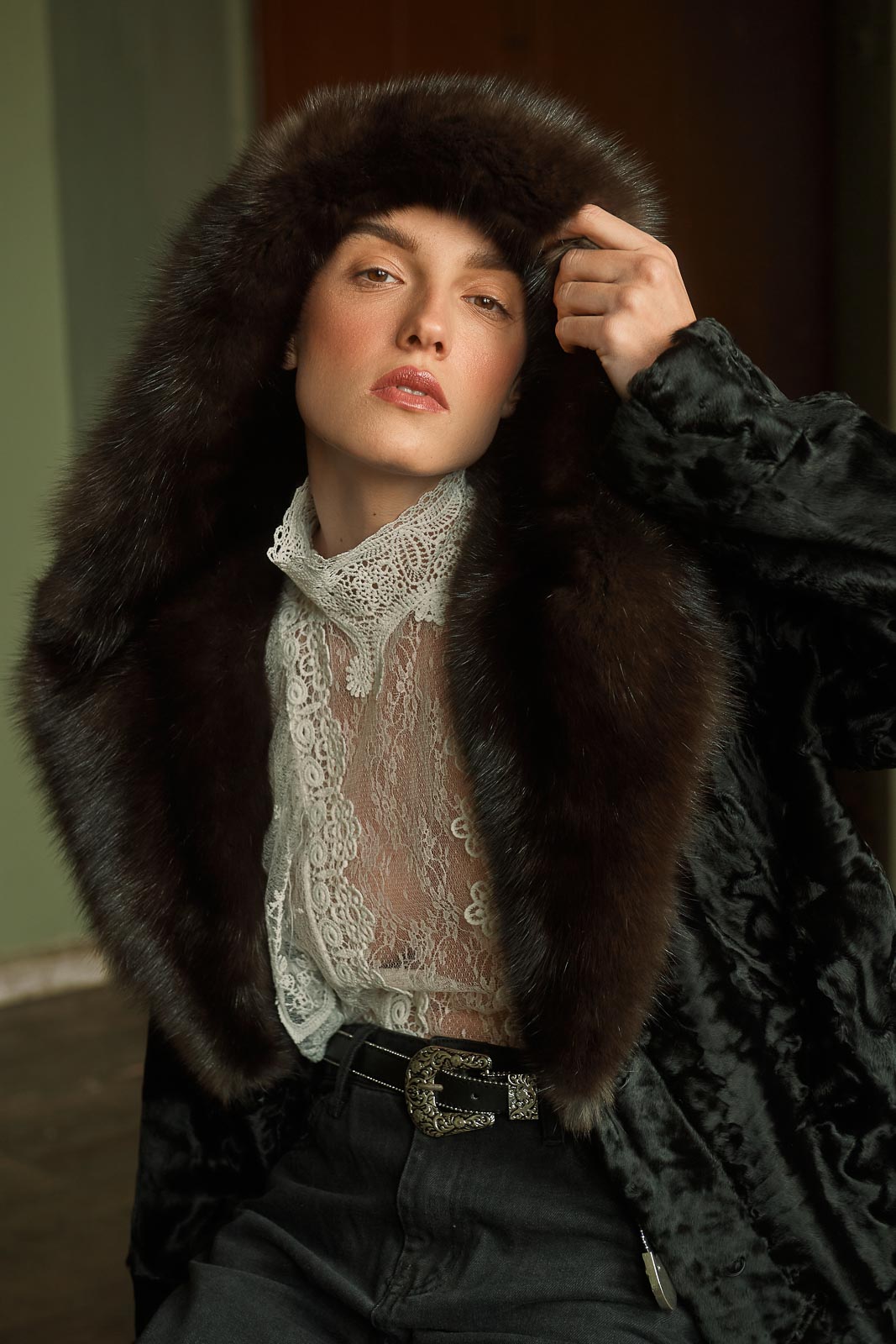 Model wearing a Black Swakara fur coat by manzari