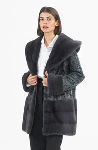 Model wearing a Grey Swakara fur coat by manzari